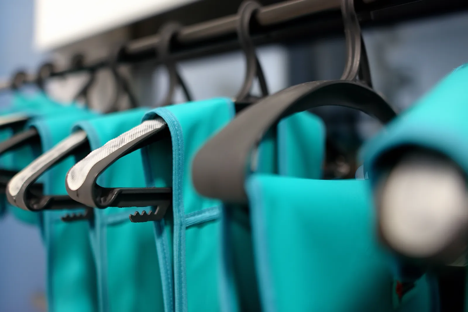 a-stand-with-lead-aprons-which-using-for-protectio-2026-03-19-03-54-21-utc Lead aprons hanging on a rack for radiation protection