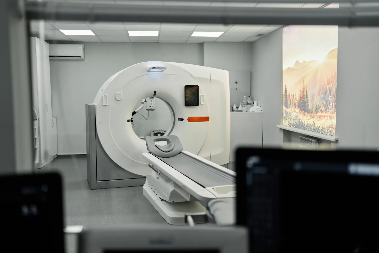 modern-ct-scanner-in-bright-clean-hospital-room-2026-03-16-05-10-20-utc CT scanner in a bright, clean hospital room